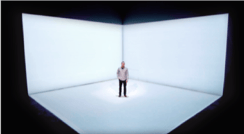 3D projection mapping of man in blank studio space