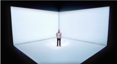 Man standing on an empty stage