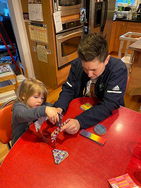 VMG Studios producer Cyndi Butz-Houghton playing with her daughter during COVID-19 while working remotely