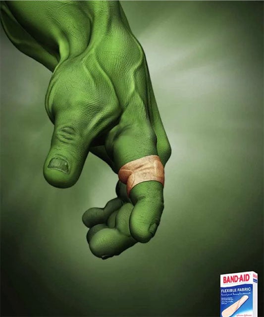 The Incredible Hulk's hand with a finger wrapped in a Band-Aid