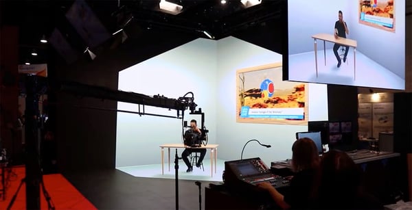 Man sitting in a studio in a makeshift office space with extended reality technology 